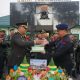 Polda Sultra Beri Kejutan Tumpeng dan Kue Ulang Tahun di HUT ke-80 TNI di Yonif 725/Woroagi